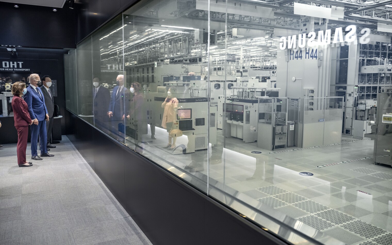 President Joe Biden participates in a tour, Friday, May 20, 2022, at Samsung Electronics Pyeongtaek Campus in Pyeongtaek, South Korea. 