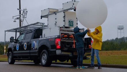 NOAA Weather Research Balloon next to truck