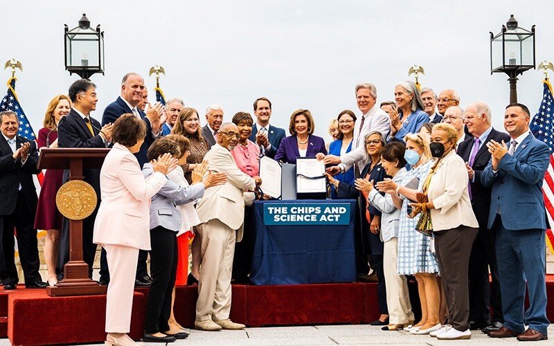 Nancy Pelosi signs the Chips and Science Act