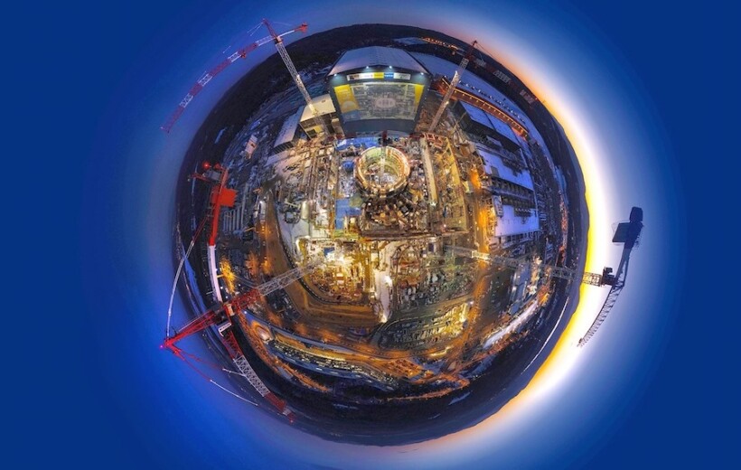 The ITER site in southern France is buzzing with construction activity, as this recent fisheye view shows. Researchers announced in December that construction of the experimental fusion reactor is halfway complete.  (Image credit – ITER)