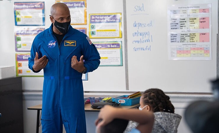 Astronaut Victor Glover speaking at elementary school