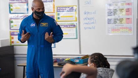 Astronaut Victor Glover speaking at elementary school