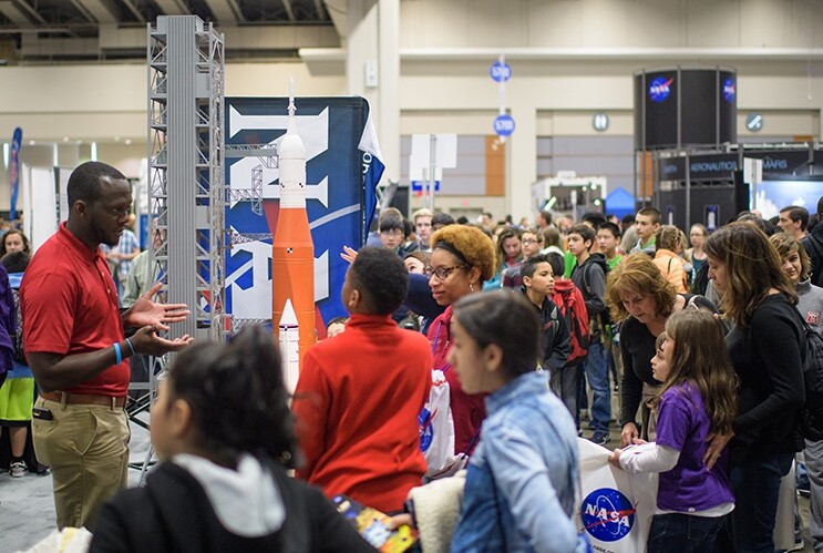 Attendees visit NASA exhibits during the 2018 USA Science and Engineering Festival in Washington, D.C.