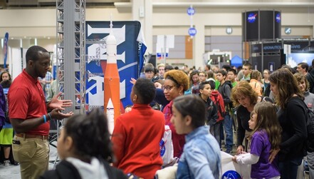 Attendees visit NASA exhibits during the 2018 USA Science and Engineering Festival in Washington, D.C.