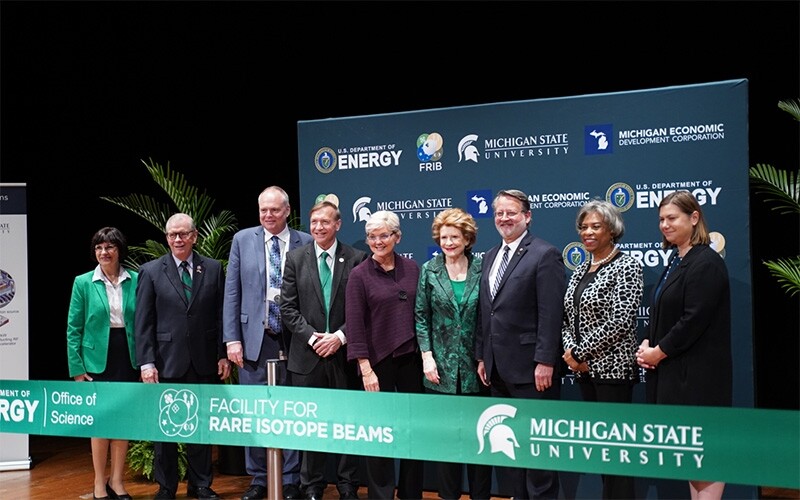 On May 2, Energy Secretary Jennifer Granholm, center, participated in a ribbon-cutting ceremony marking the beginning of science operations at the Facility for Rare Isotope Beams. 