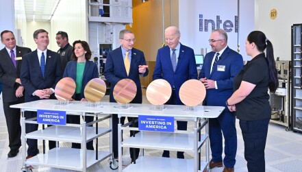 Intel CEO Pat Gelsinger (center) speaks with U.S. President Joe Biden