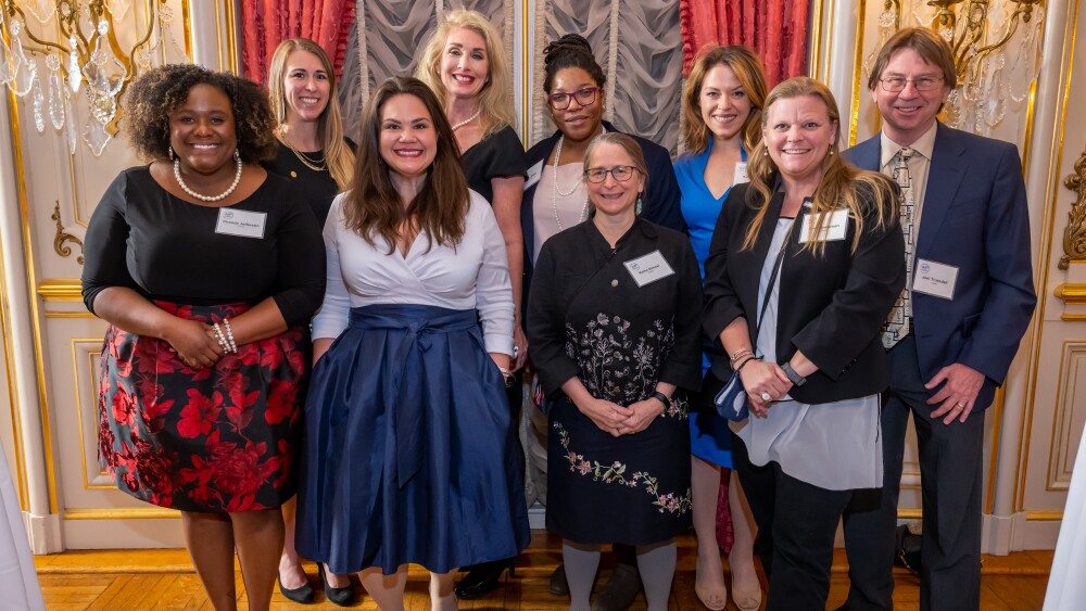 Guests enjoy a cocktail reception at the Cosmos Club