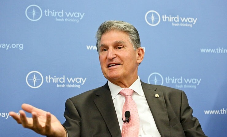 Manchin speaking at a think tank