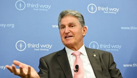 Manchin speaking at a think tank