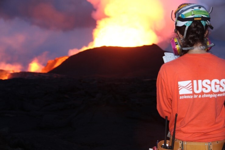 A USGS geologist from the Hawaiian Volcano Observatory monitors the 2018 eruption of Mount Kilauea.