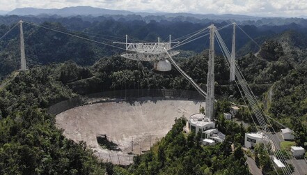 The damaged Arecibo telescope