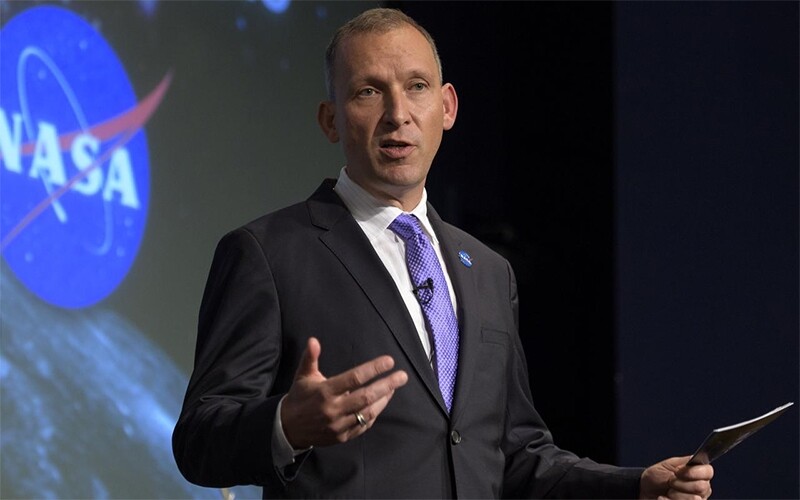 Thomas Zurbuchen speaking in 2018 at an event announcing the selection of companies eligible to provider lander services for NASA’s lunar science program