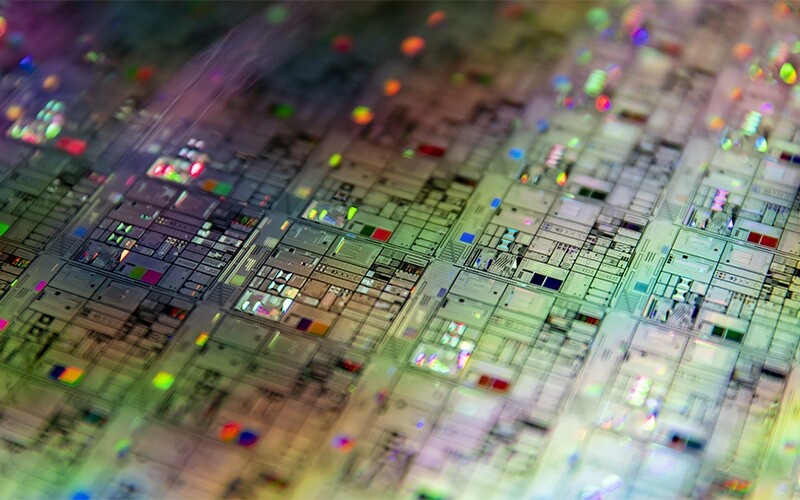 A close-up view of a 300-millimeter quantum photonic wafer.