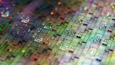 A close-up view of a 300-millimeter quantum photonic wafer.