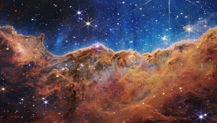 “Cosmic Cliffs” in the Carina Nebula, captured by JWST. Credit: NASA, ESA, CSA, STScI