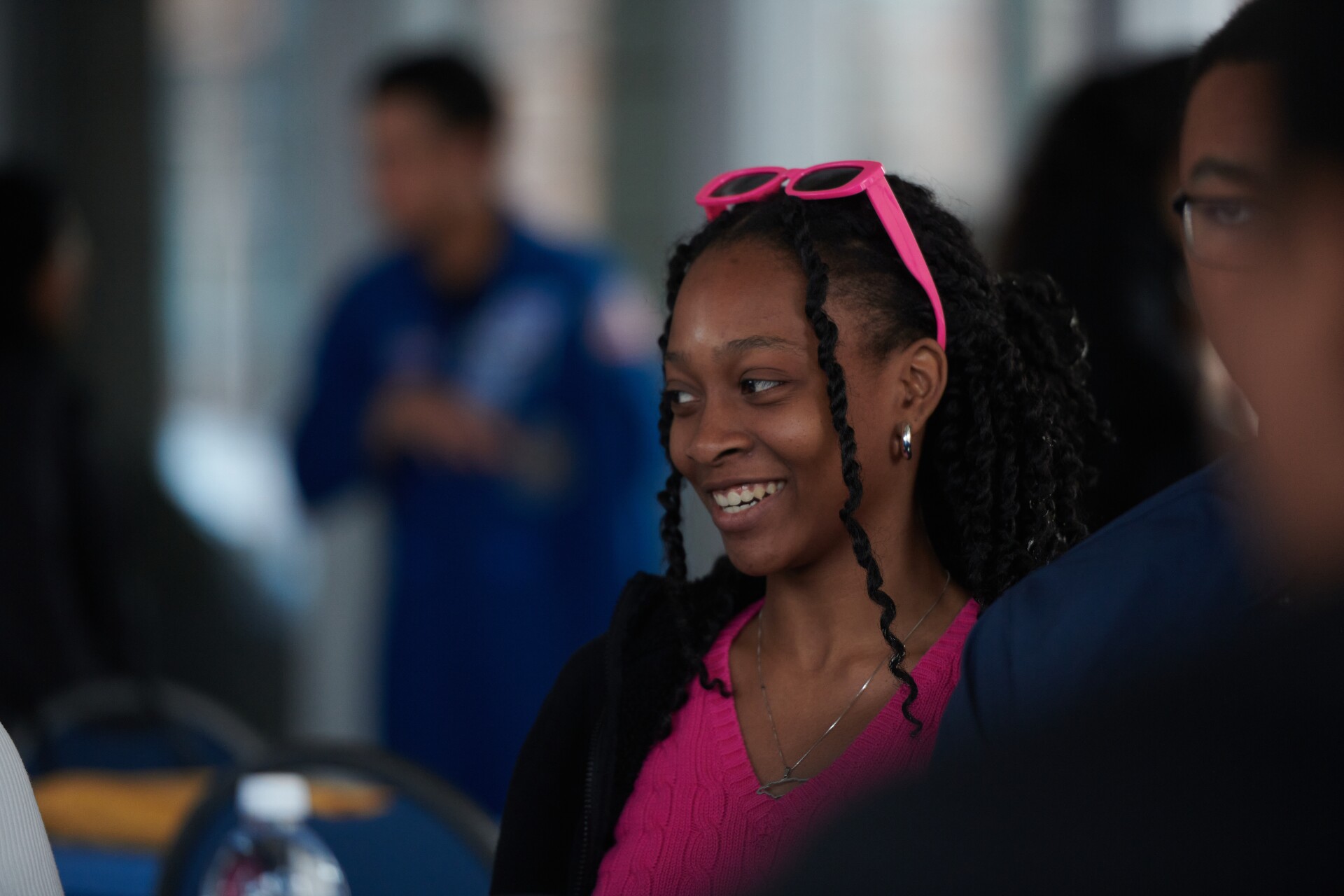 Student with pink sunglasses at AIPF NASA Howard Watkins event