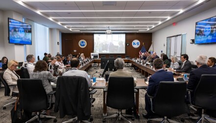 National Science Board members seated at a meeting.