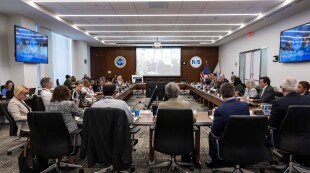 National Science Board members seated at a meeting.